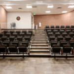 Small lecture hall featuring new seating and improve ADA accessible space