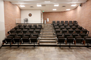 Small lecture hall featuring new seating and improve ADA accessible space